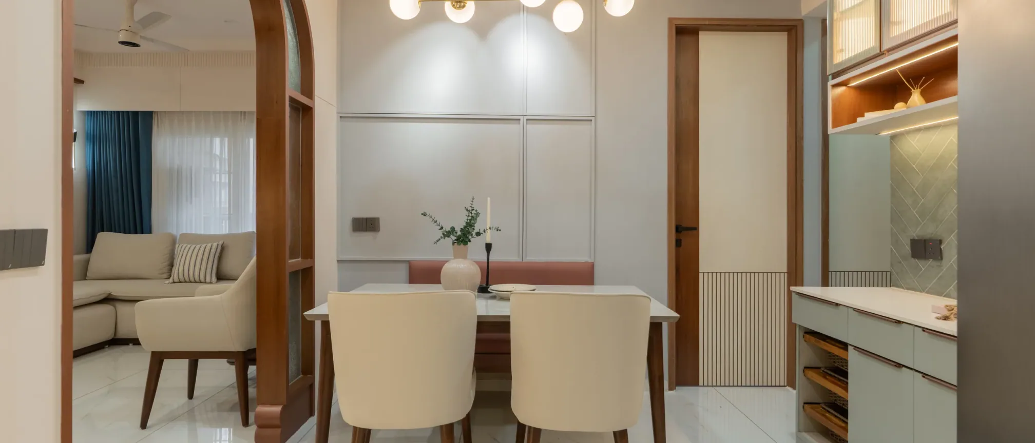 Dining area at Anand Nilay, Sarthya West, interior design by Ekaya Design Studio