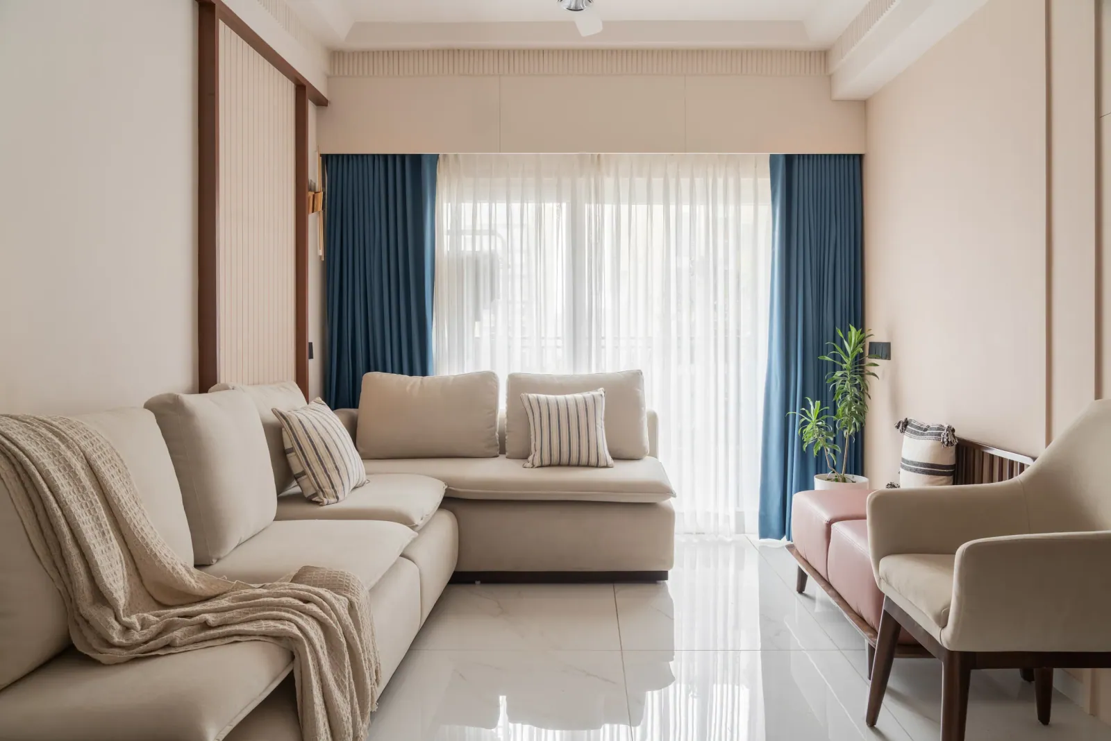 Living room at Anand Nilay, Sarthya West, interior design by Ekaya Design Studio