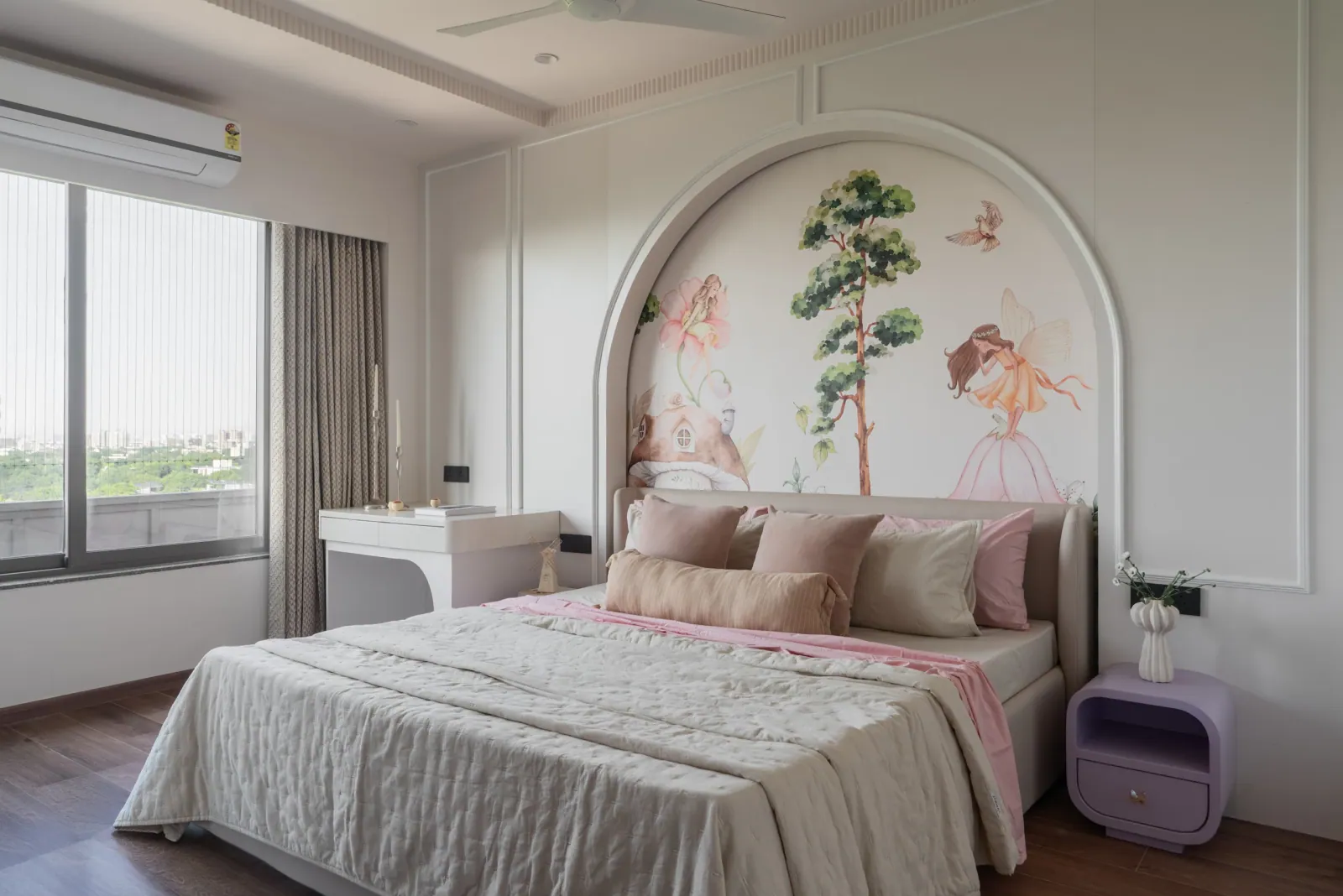 Daughter's bedroom with hand-painted mural at Ayaan, interior design by Ekaya Design Studio