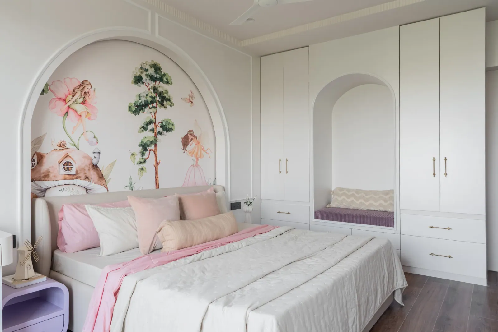 Daughter's bedroom with hand-painted mural at Ayaan, interior design by Ekaya Design Studio