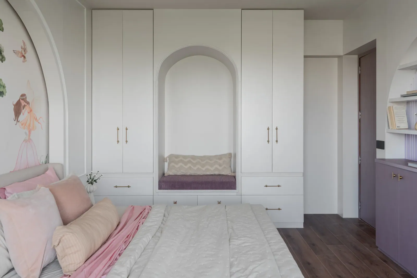 Daughter's bedroom with hand-painted mural at Ayaan, interior design by Ekaya Design Studio