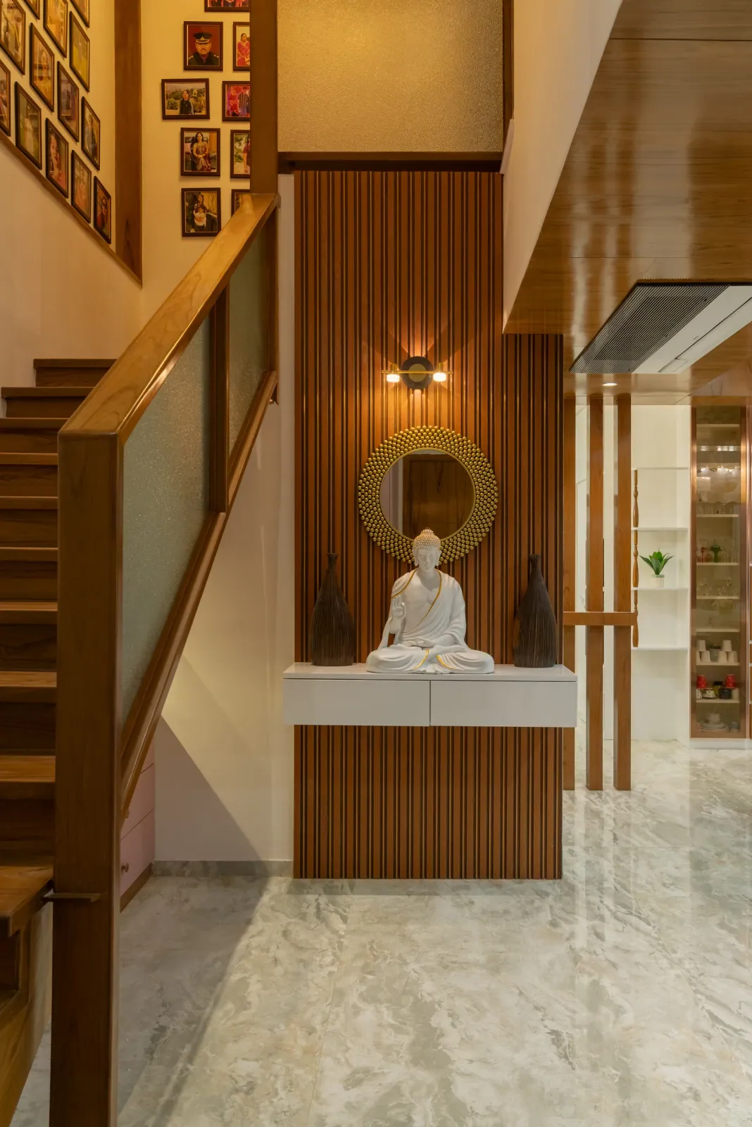 Staircase and foyer console at Bouganville, interior design by Ekaya Design Studio