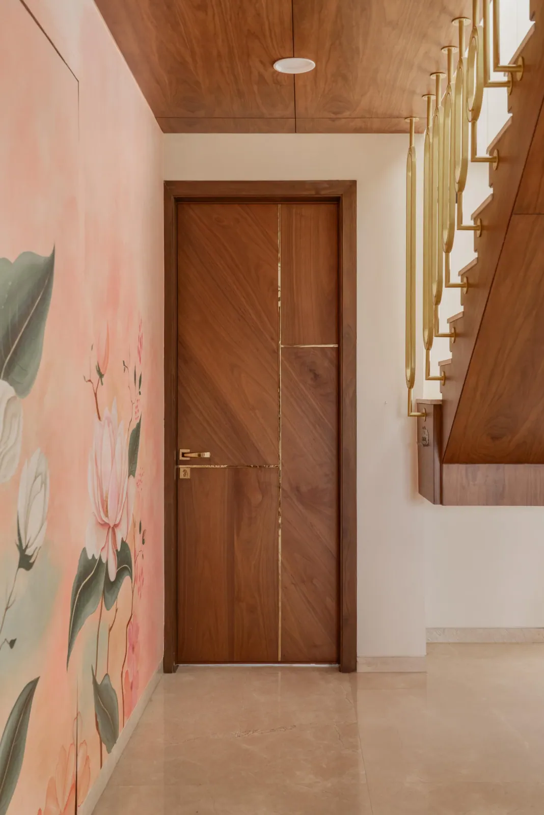 Entrance passage with hand-painted mural at Untitled Duplex (Editorial Submission), interior design by Ekaya Design Studio