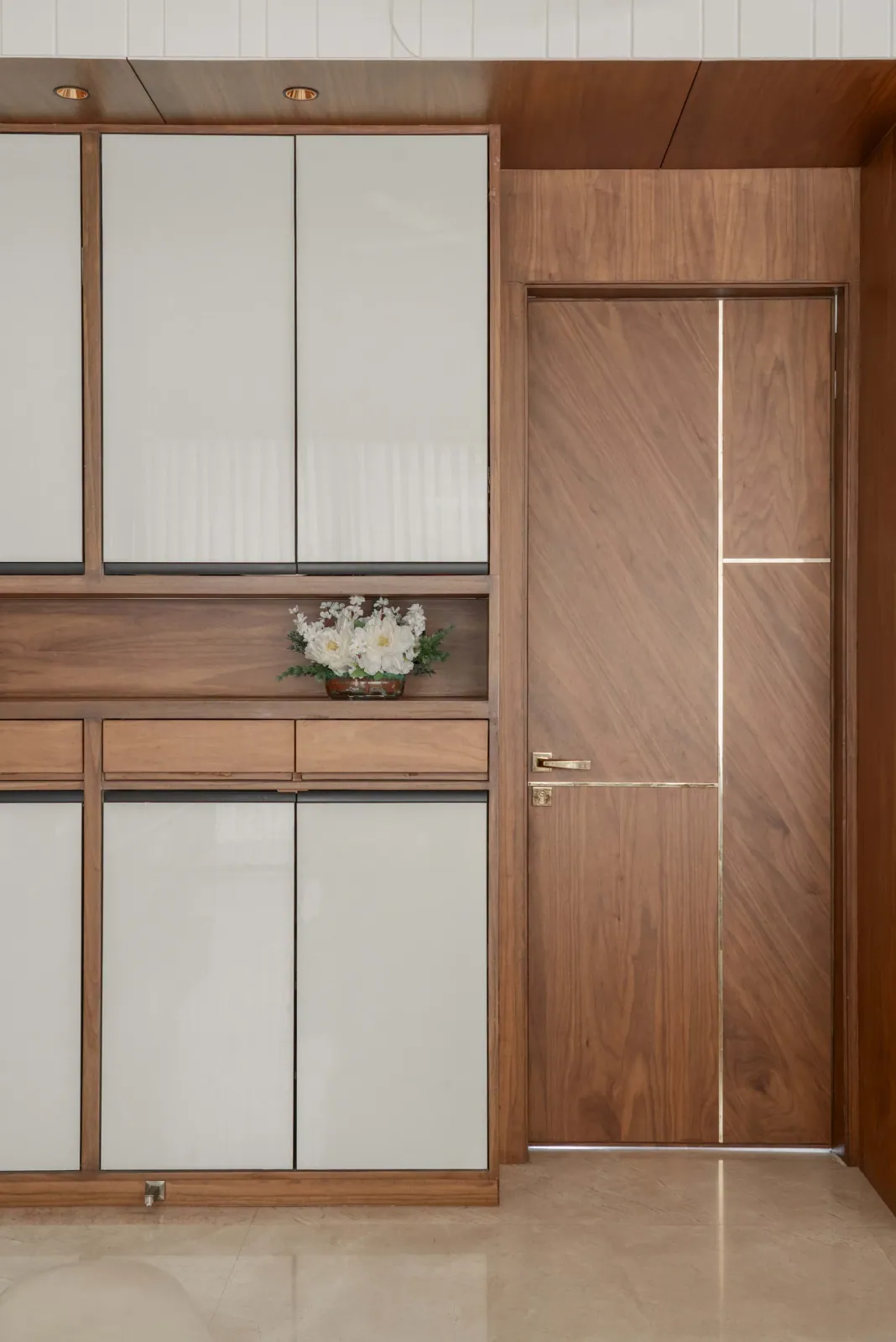 Foyer storage at Untitled Duplex (Editorial Submission), interior design by Ekaya Design Studio