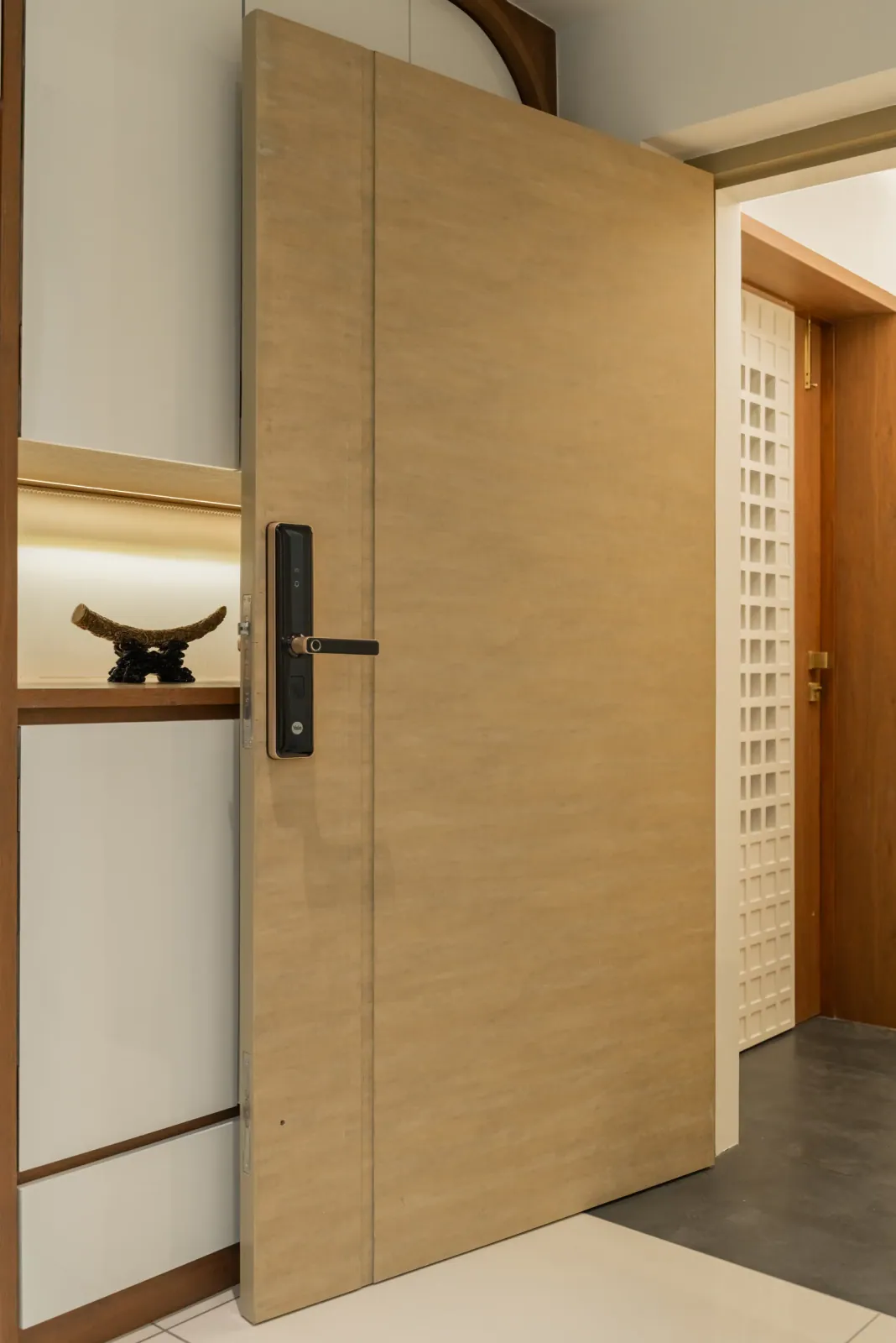 Entrance door at Emerald 3, interior design by Ekaya Design Studio