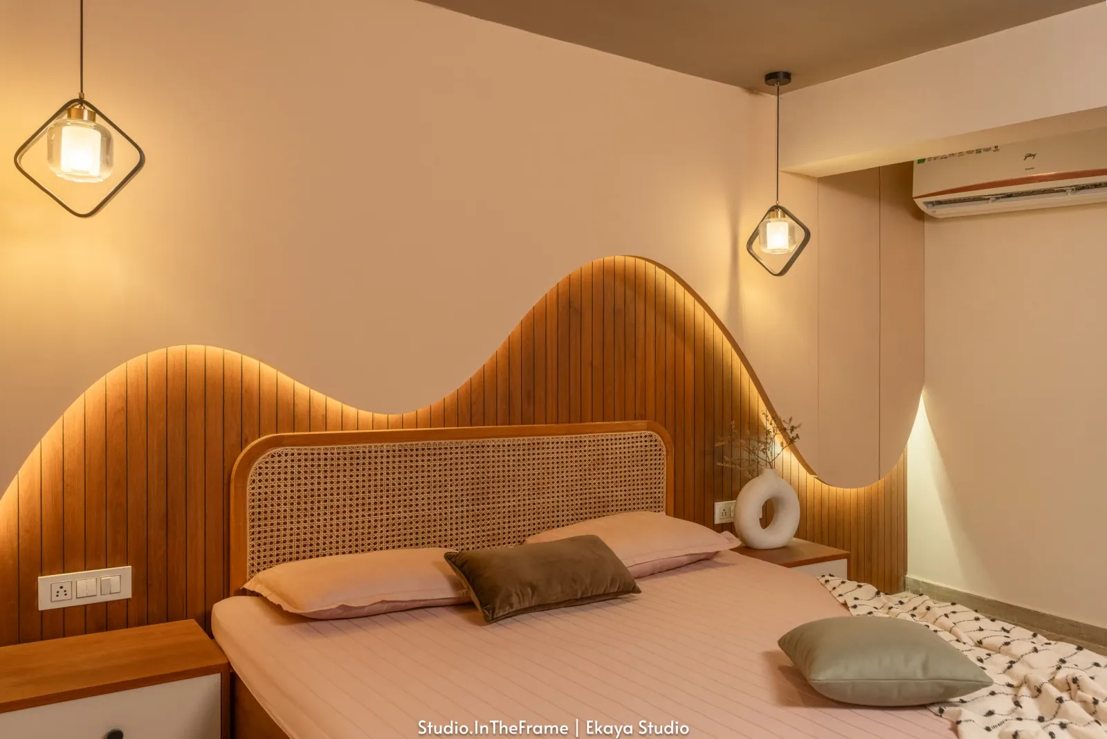 Bedroom with sculpted headboard at Pushkar, interior design by Ekaya Design Studio
