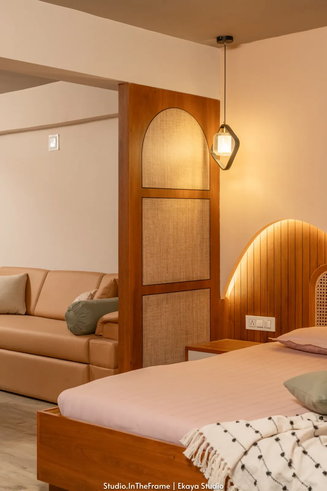 Bedroom with sculpted headboard at Pushkar, interior design by Ekaya Design Studio