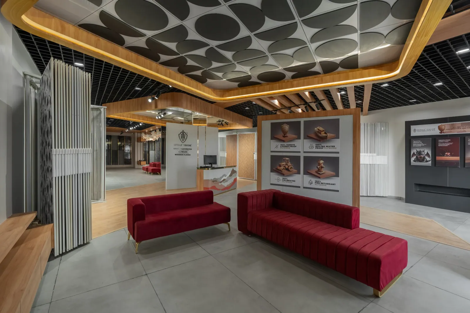 Lounge seating at Royale Touche Showroom, Palanpur, interior design by Ekaya Design Studio