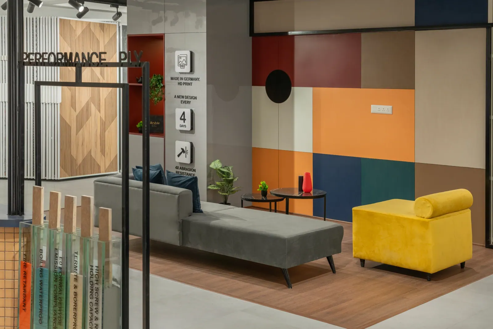 Lounge seating at Royale Touche Showroom, Porbandar, interior design by Ekaya Design Studio