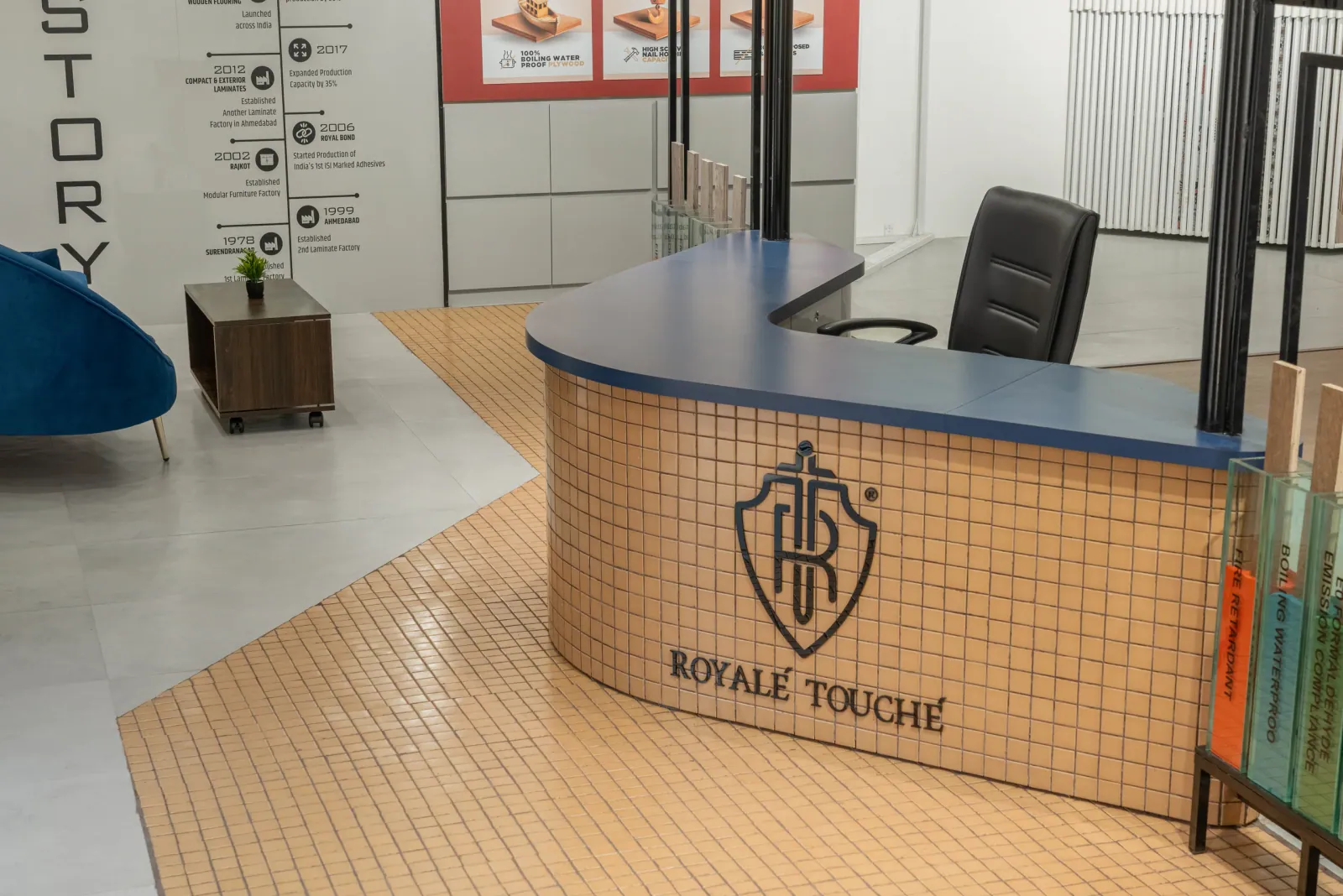 Reception desk at Royale Touche Showroom, Porbandar, interior design by Ekaya Design Studio