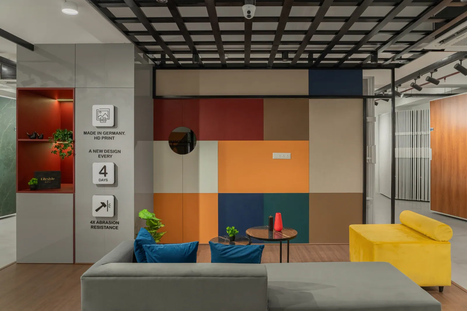 Lounge seating at Royale Touche Showroom, Porbandar, interior design by Ekaya Design Studio