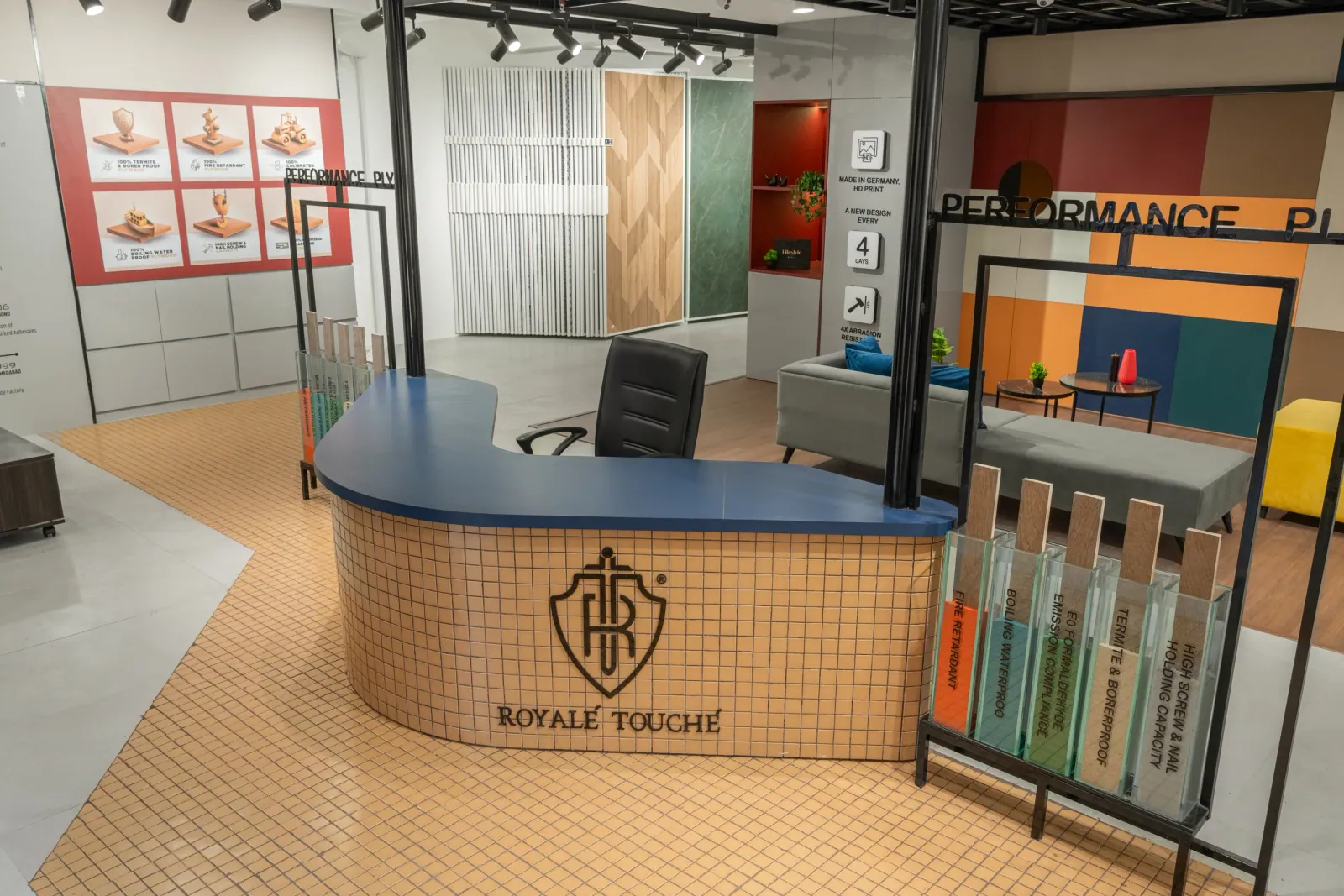 Reception desk at Royale Touche Showroom, Porbandar, interior design by Ekaya Design Studio