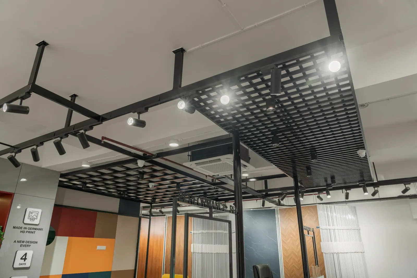 Ceiling detail at Royale Touche Showroom, Porbandar, interior design by Ekaya Design Studio