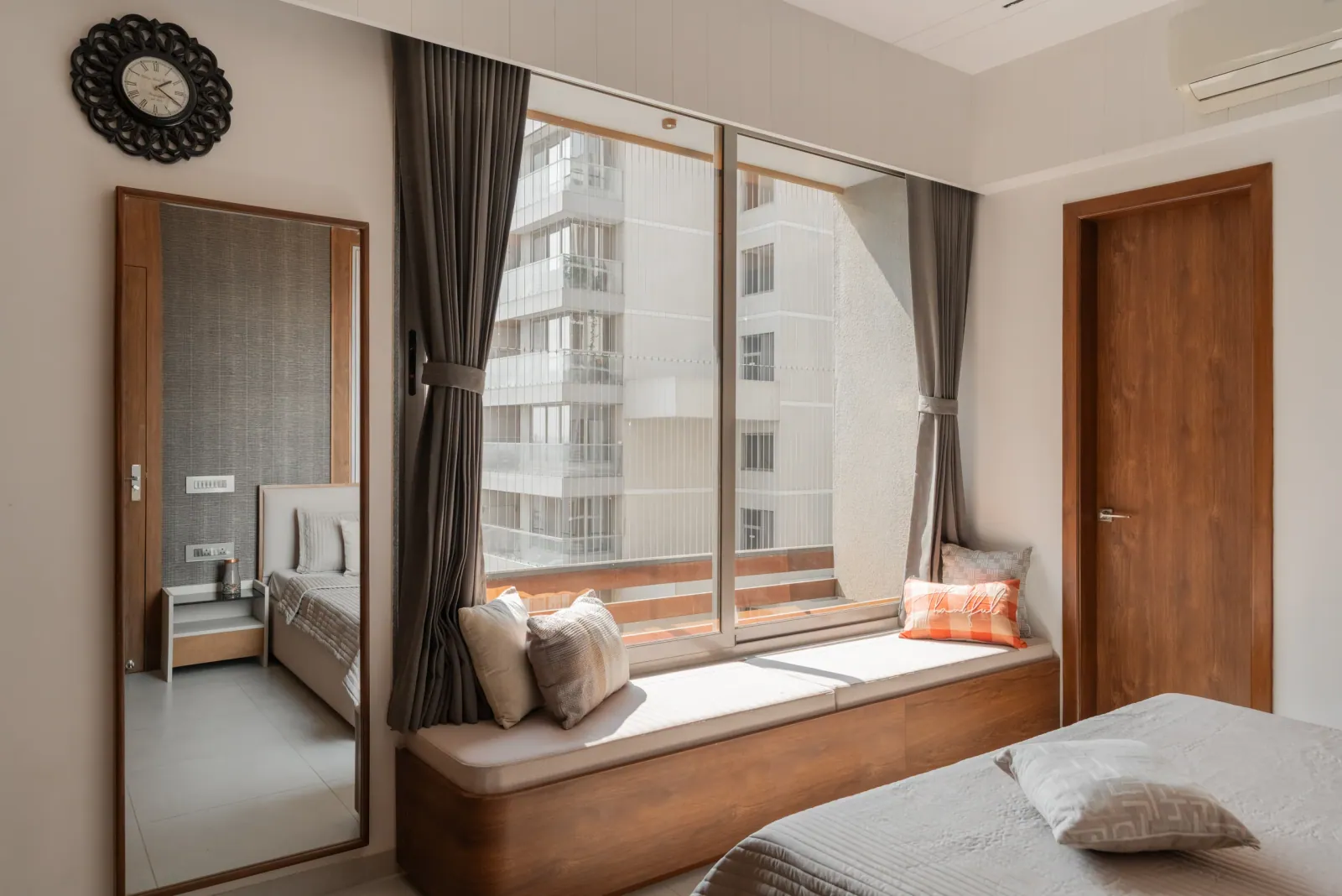 Bedroom window seat at Satyamev Serene, interior design by Ekaya Design Studio