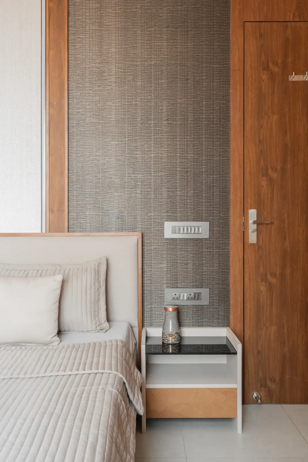 Bedroom at Satyamev Serene, interior design by Ekaya Design Studio