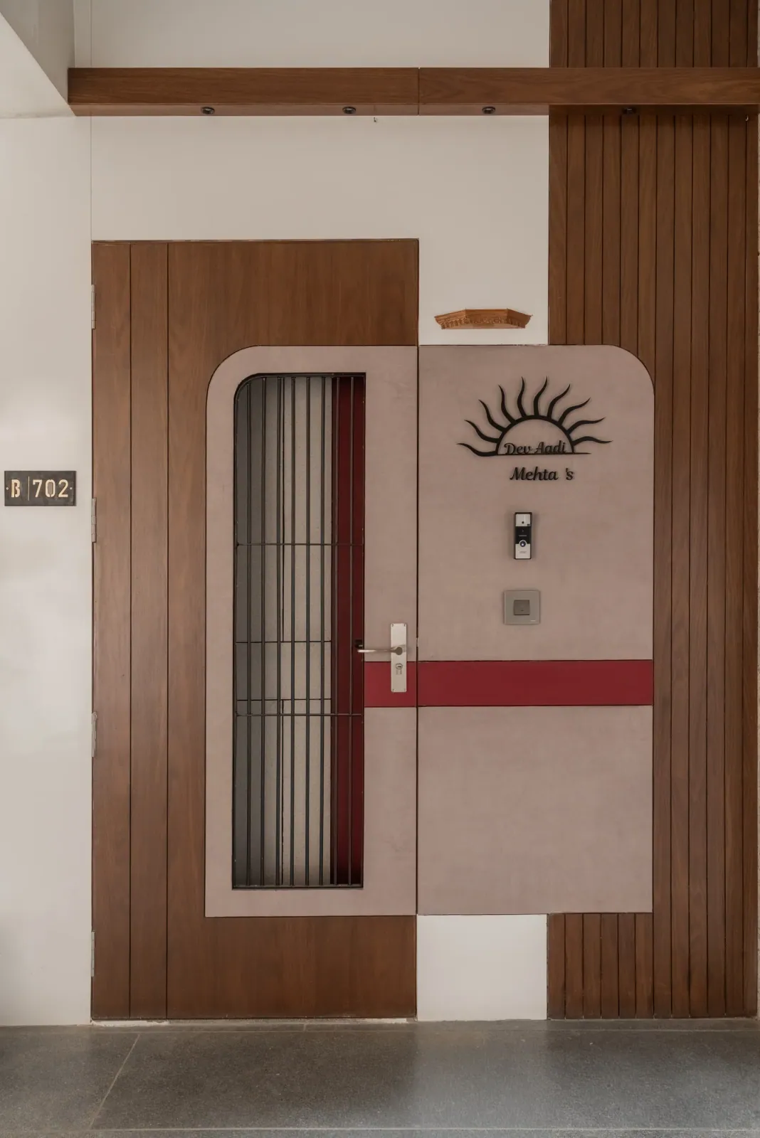 Entrance door at Satyamev Serene, interior design by Ekaya Design Studio