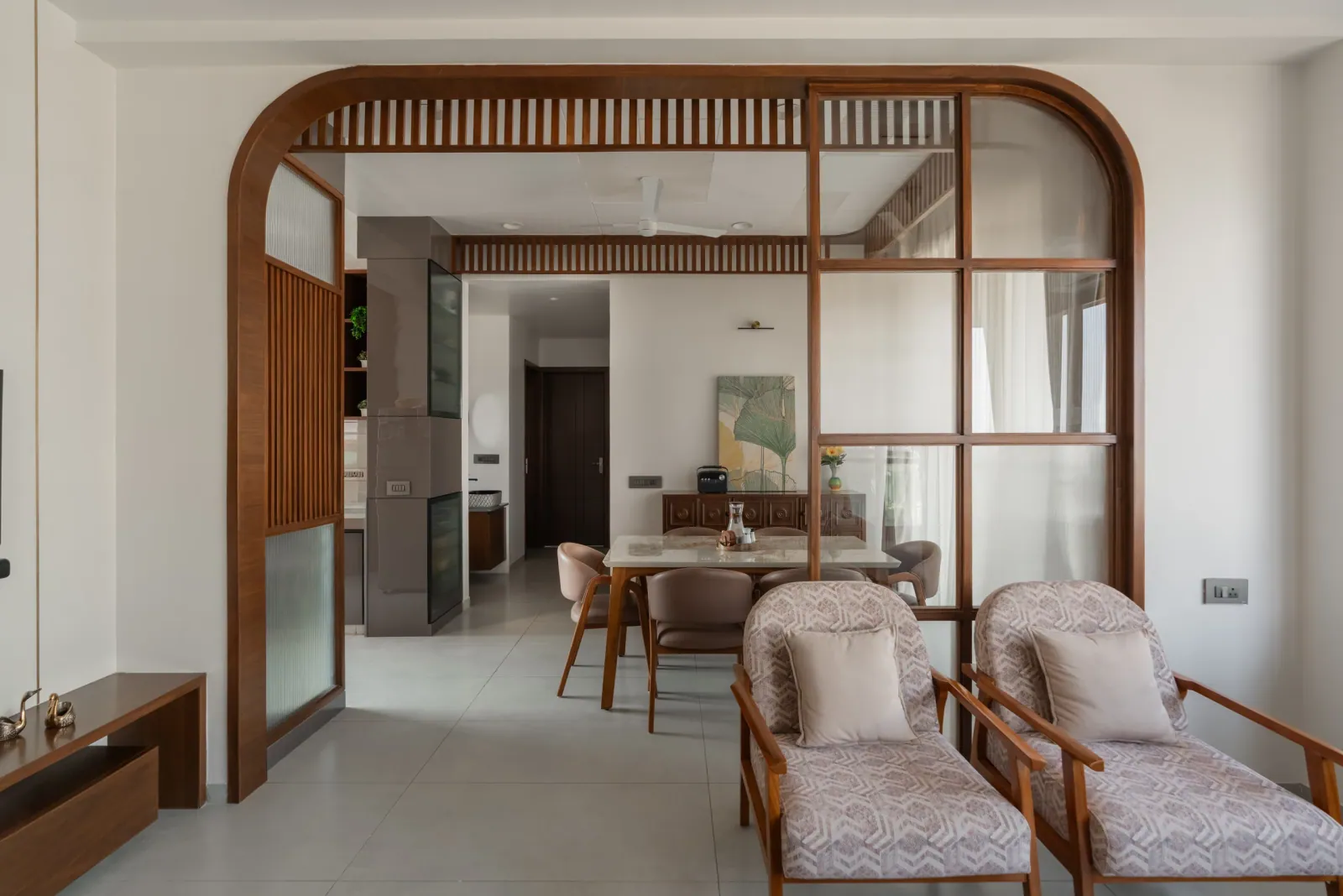 Living and dining area at Satyamev Serene, interior design by Ekaya Design Studio