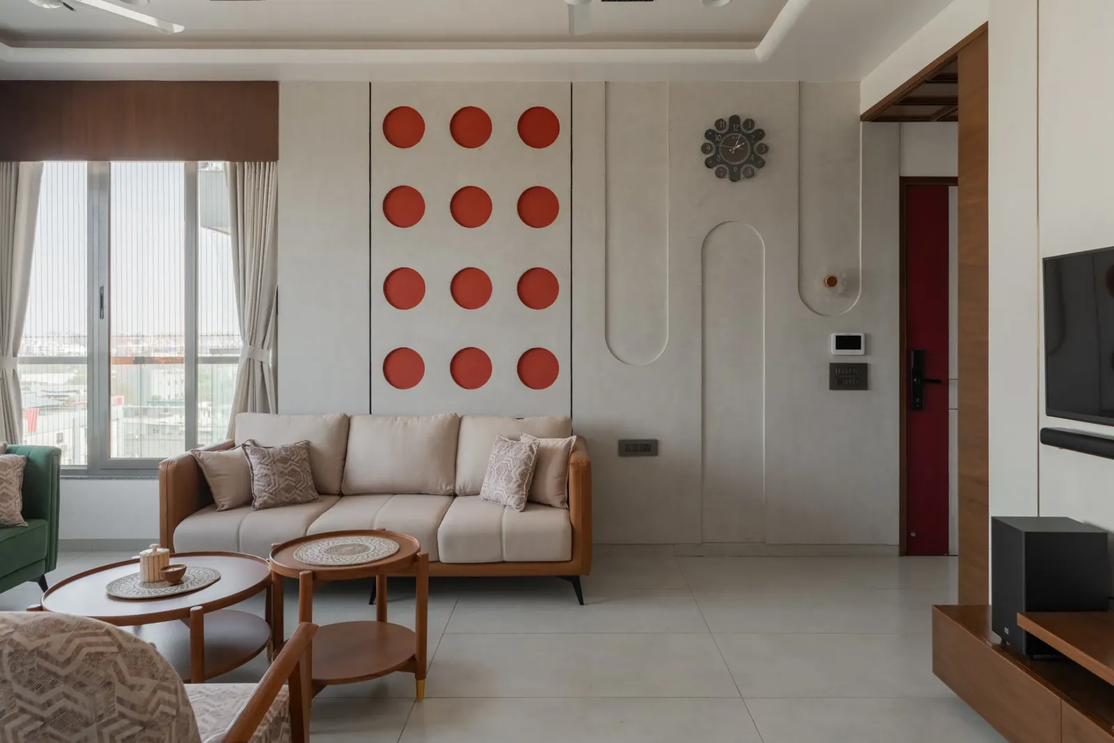 Living room at Satyamev Serene, interior design by Ekaya Design Studio