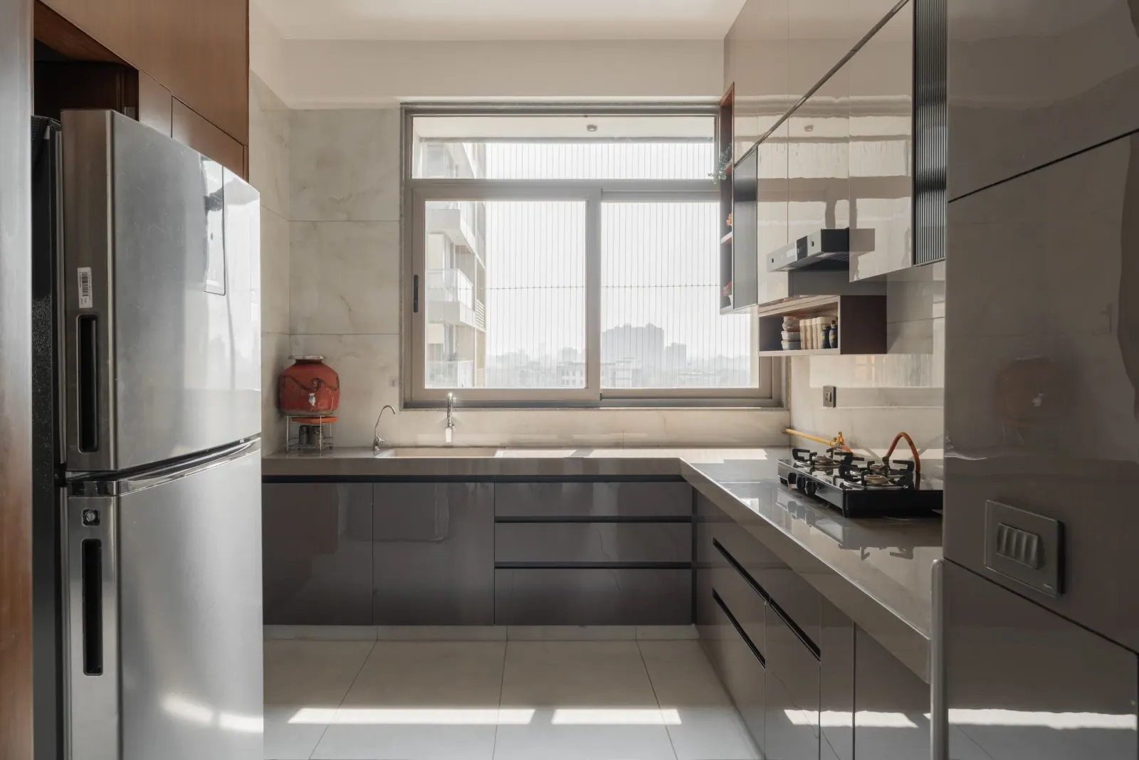Kitchen at Satyamev Serene, interior design by Ekaya Design Studio