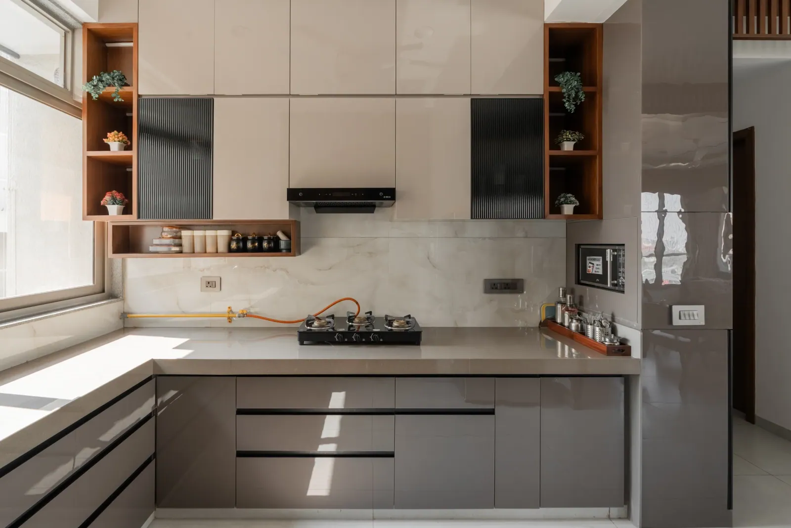 Kitchen at Satyamev Serene, interior design by Ekaya Design Studio