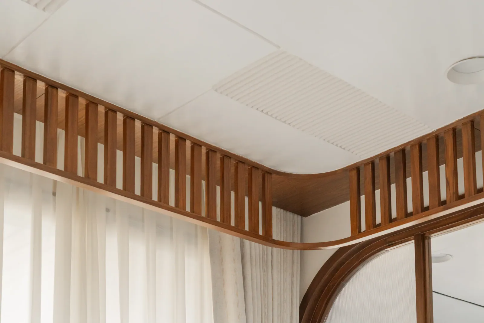 Arched partition detail at Satyamev Serene, interior design by Ekaya Design Studio