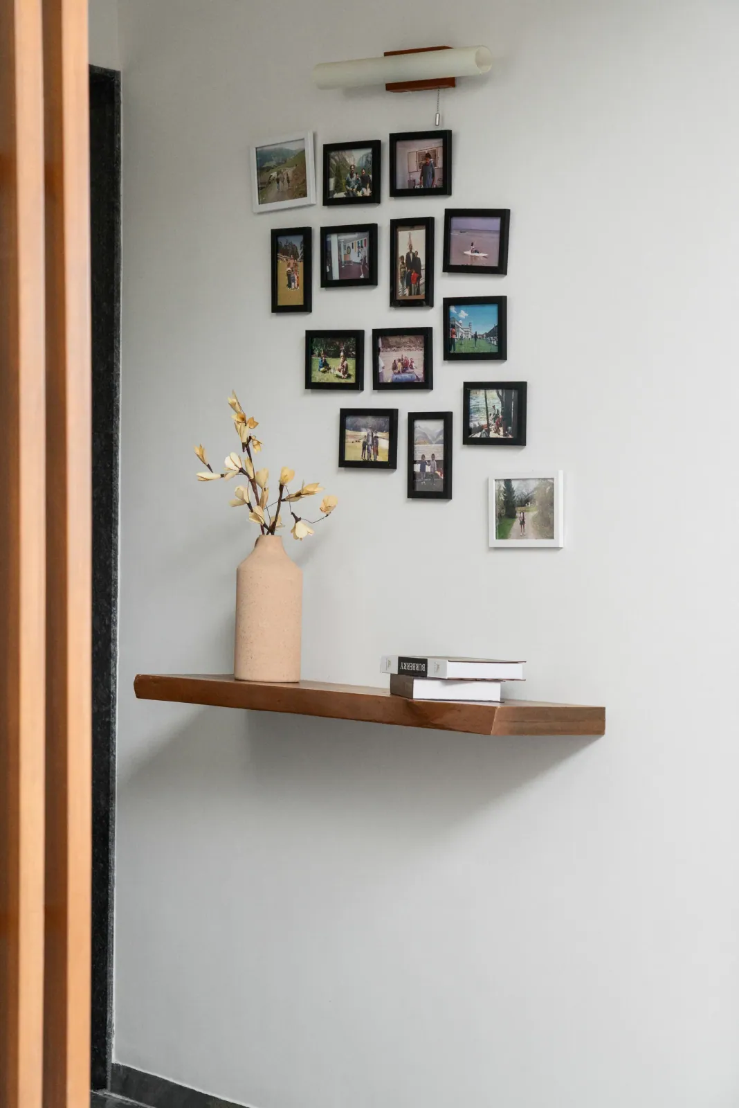Photo wall at Shreeya Kromme, interior design by Ekaya Design Studio
