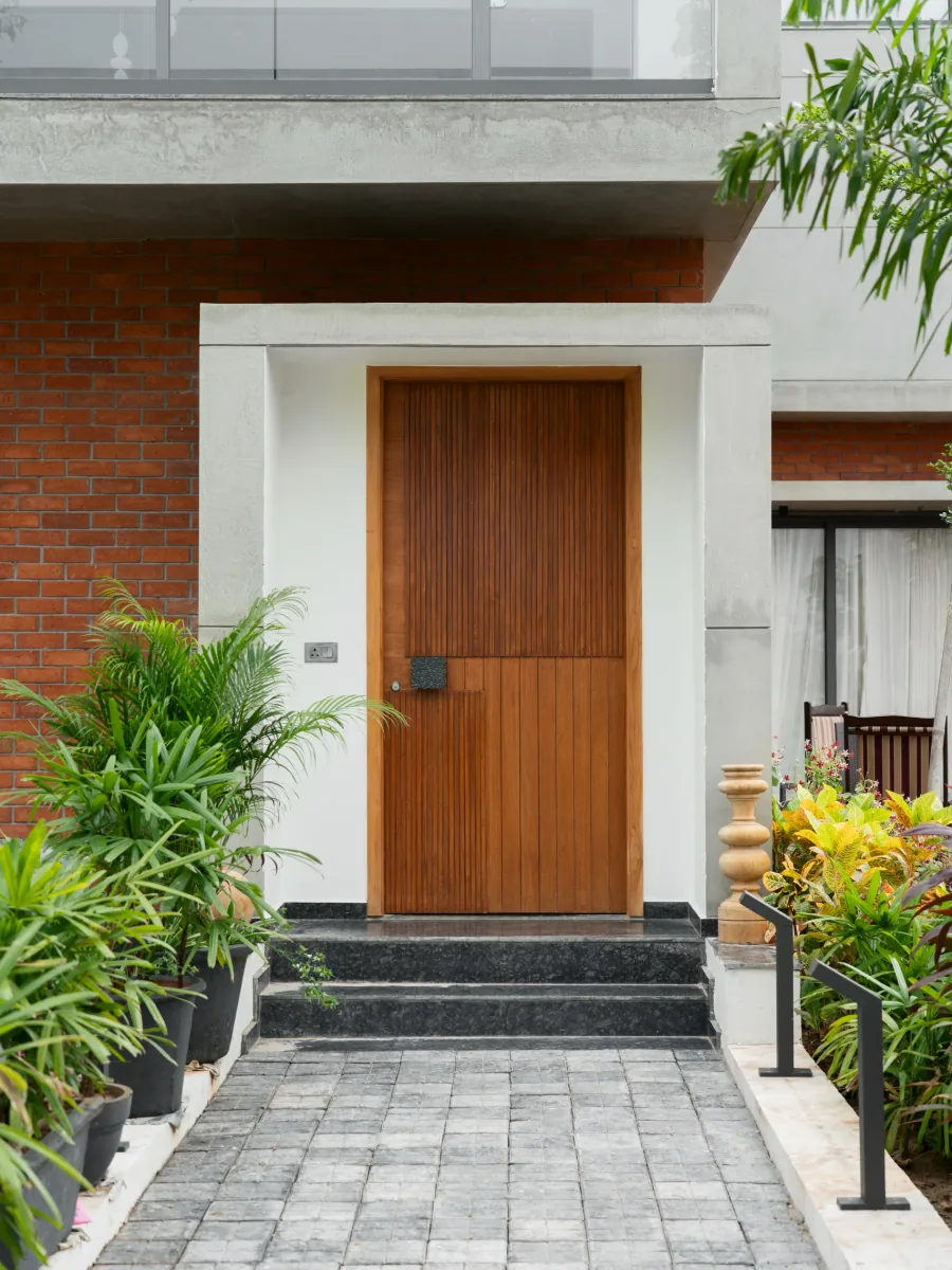 Entrance pathway at Shreeya Kromme, interior design by Ekaya Design Studio