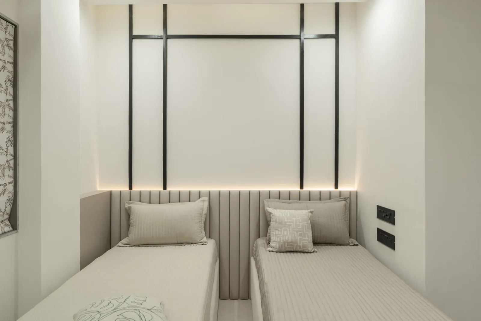 Bedroom with twin beds at Suryavanshi, interior design by Ekaya Design Studio
