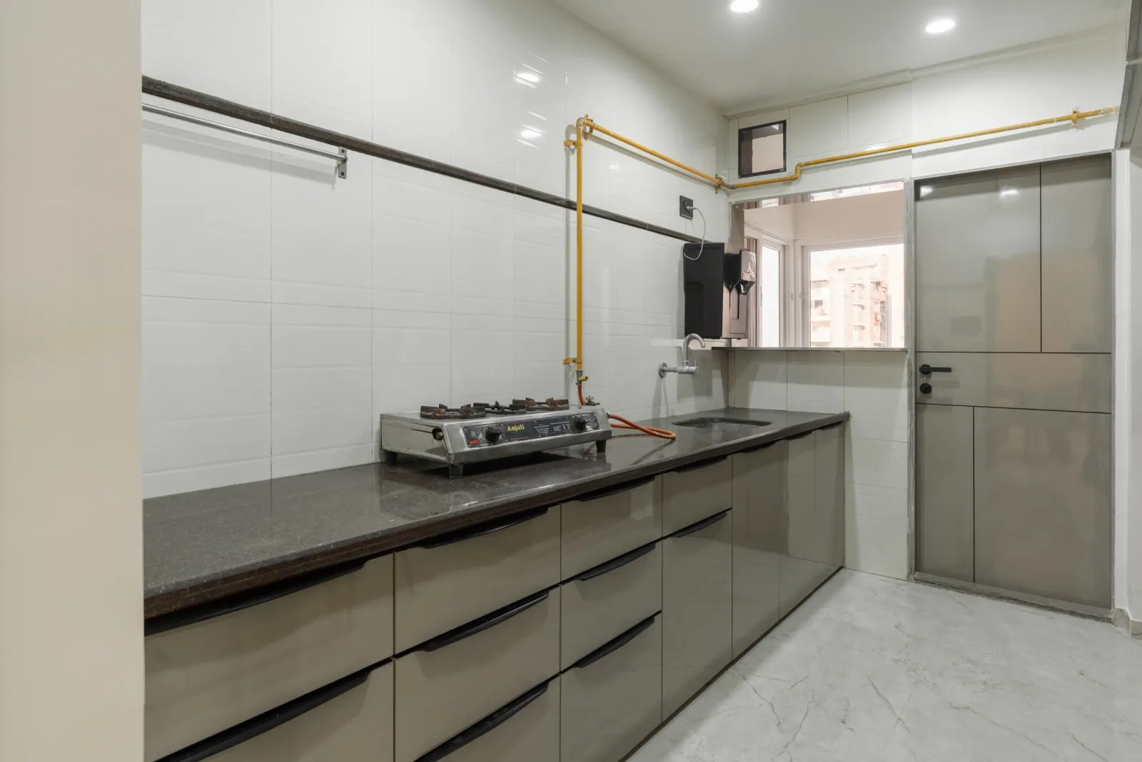 Kitchen at Suryavanshi, interior design by Ekaya Design Studio