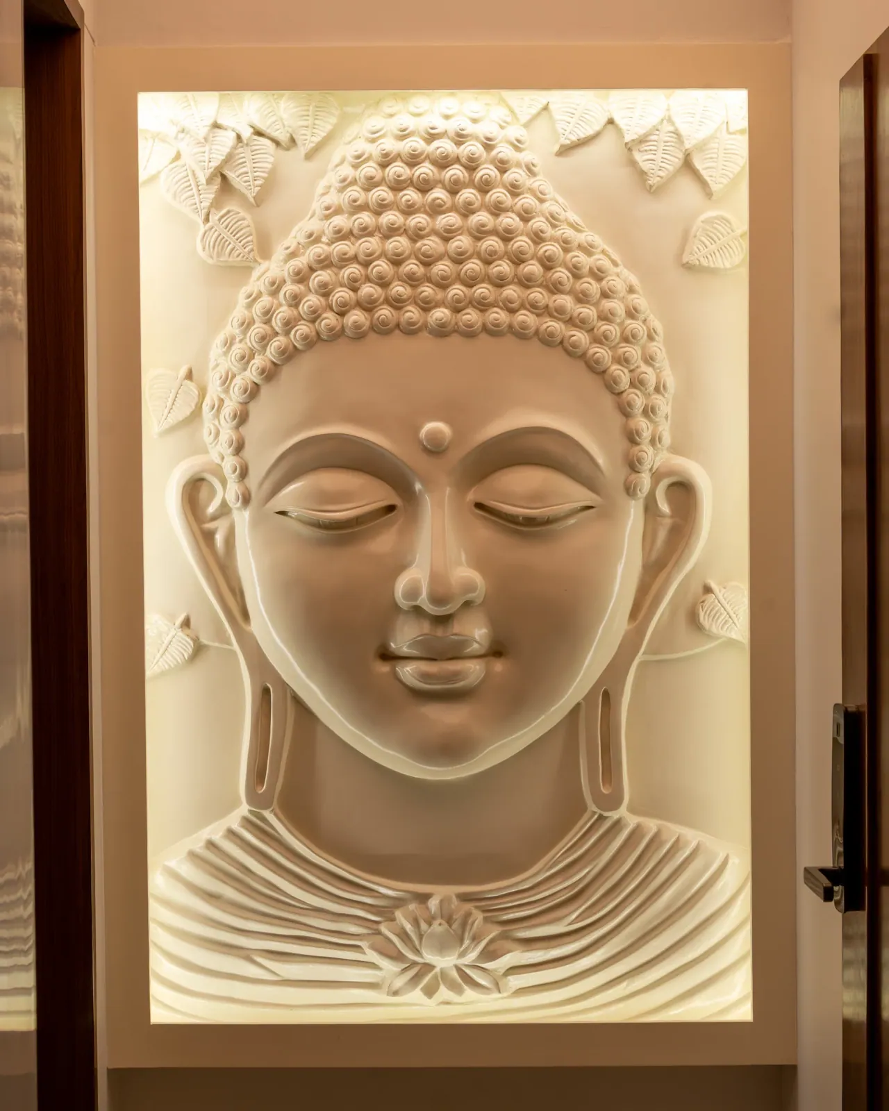 Buddha wall panel at Swati Parkside, interior design by Ekaya Design Studio